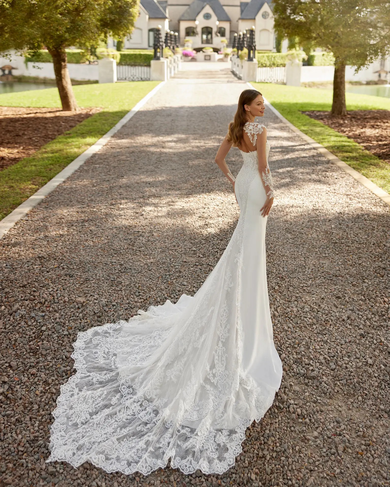 Eloise wedding dress by Rosa Clara at Columbus Ohio Trunk Show with sleeves and long detailed train