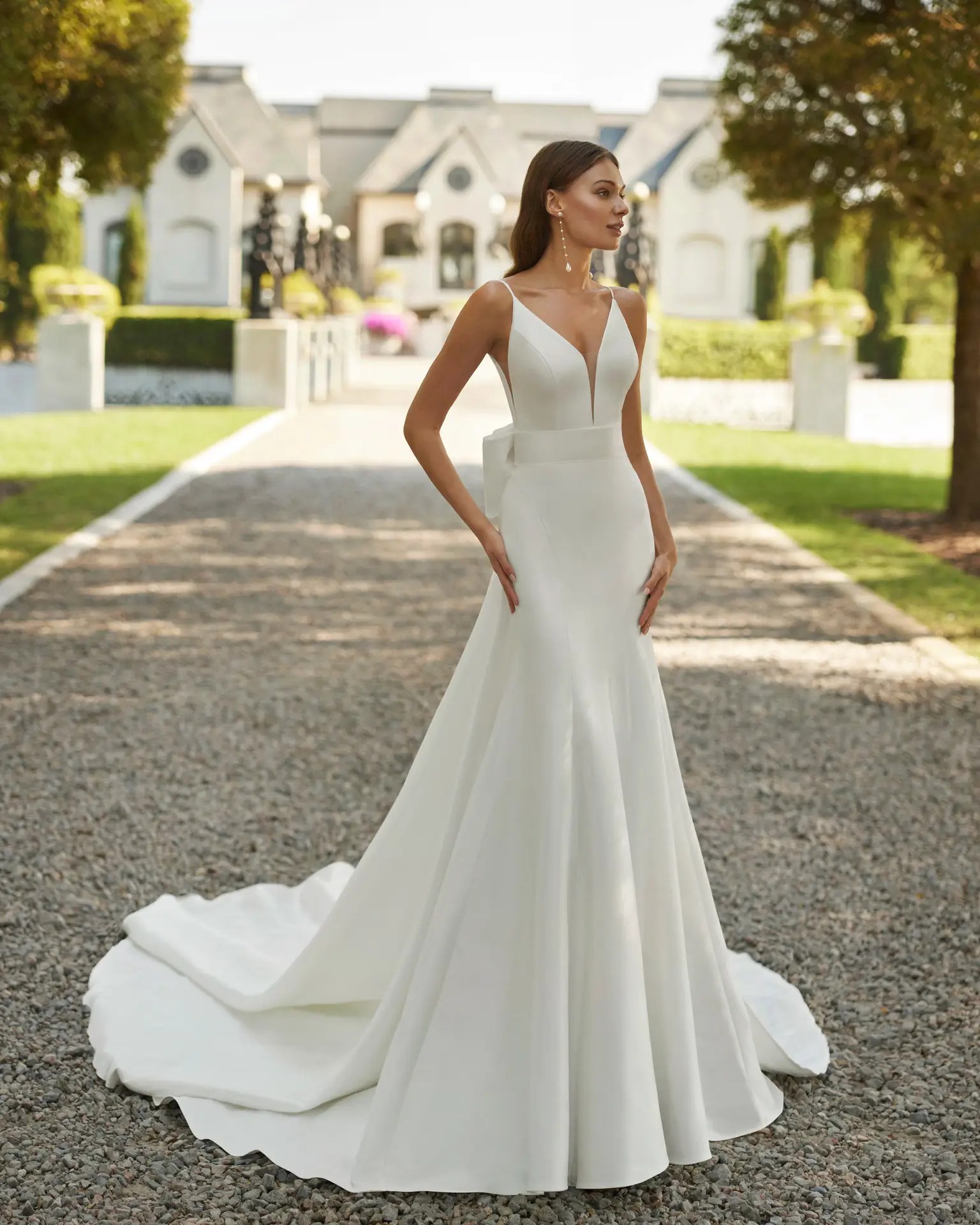 Esther stretch mikado fitted wedding dress by Rosa Clara in Columbus, Ohio for trunk show with long train and spaghetti straps