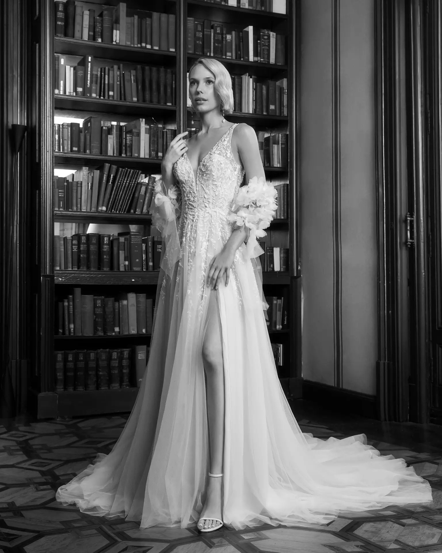 Jody Rosa Clara Gatsby wedding dress with plunging beaded neckline and flowy tulle skirt with a slit in Columbus Ohio